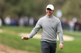 Rory McIlroy acknowledges the crowd after his opening round hole-in-one at the PGA Tour's Pebble Beach Pro-Am tournament in California on Thursday