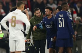 Warren Zaire-Emery (2nd R) limped off the field in the final minutes of PSG's win at Stuttgart