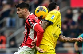 AC Milan's Spanish forward Alvaro Morata (L) in action during a Serie A game against Parma at the San Siro