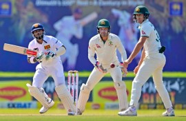 Sri Lanka's Kusal Mendis (L) plays a shot during the second day of second Test 