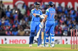 England's Jacob Bethell celebrates reaching a half-century against India in Nagpur
