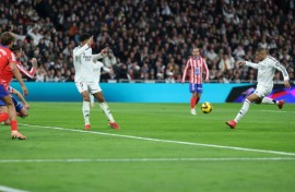 Real Madrid's Kylian Mbappe levels for his side in the derby clash against Atletico Madrid