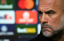 Manchester City manager Pep Guardiola speaks to the press on the eve of the first leg of their Champions League playoff against Real Madrid