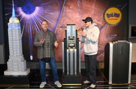 Pete Davidson (R) who voices the titular character in the animated movie 'Dog Man,'  visits The Empire State Building with Dav Pilkey to celebrate the film's premier