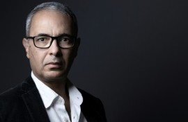 Writer Kamel Daoud is being sued in France for invasion of privacy by an Algerian survivor of a 1990s massacre in the North African country