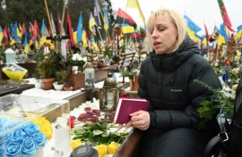 Natalia reads poems to her dead husband in Lviv