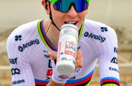 Tadej Pogacar in his distinctive world champion's rainbow jersey