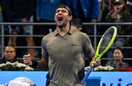 Matteo Berettini celebrates a long-awaited victory  over Novak Djokovic 