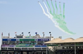 Pakistan Air Force jets fly over the National Stadium in Karachi at the opening ceremony of the ICC Champions Trophy tournament