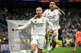 Real Madrid's French forward Kylian Mbappe celebrates scoring his team's second goal in the rout of Man City