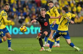 Barcelona playmaker Dani Olmo (C) broke the deadlock with a fine finish against Las Palmas