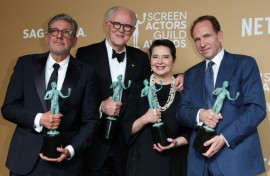 'Conclave' cast members (L-R) Sergio Castellitto, John Lithgow, Isabella Rossellini and Ralph Fiennes celebrate the film's win for best cast in a motion picture at the Screen Actors Guild Awards