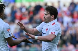 Antoine Dupont (R) scored two tries against Italy