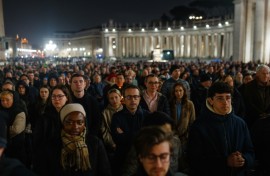 People gather to pray for the health of Pope Francis at St Peter's square 
