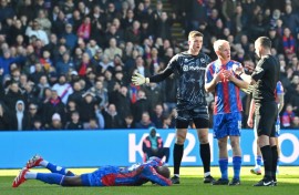 Jean-Philippe Mateta (left) was taken to hospital with a head injury 