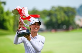 Lydia Ko celebrates with with the trophy after winning the HSBC Women's World Championship 