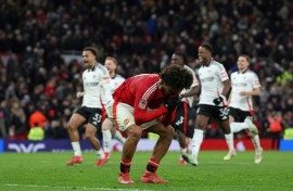 Manchester United's Joshua Zirkzee reacts after missing his penalty against Fulham