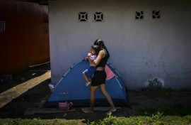 The homebound migrants have already made the arduous journey back from Mexico on foot and by bus
