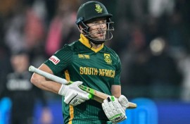 South Africa's David Miller celebrates scoring a century