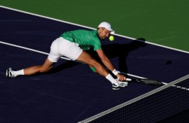 Serbia's Novak Djokovic stretches for a backhand in his shock second-round loss to Botic van de Zandschulp of the Netherlands at Indian Wells