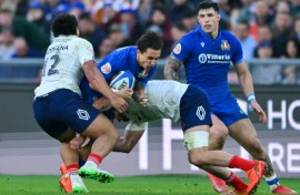 Italy's Ange Capuozzo (2nd L)