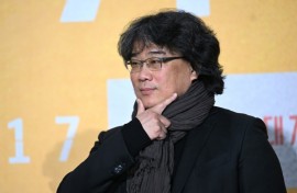 South Korean director Bong Joon-ho poses  during a press conference in Seoul to promote his new film 'Mickey 17,' a dark comedy 