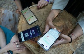 Activists demonstrate OlimpIA, a chatbot that helps victims of digital sexual violence