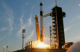This screengrab image from NASA's live broadcast shows the SpaceX Falcon 9 rocket with the Crew Dragon capsule blasting off from the Kennedy Space Center in Florida bound for the International Space Station