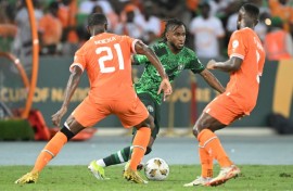 Nigeria star Ademola Lookman (C) takes on two Ivory Coast defenders during the 2024 Africa Cup of Nations final in Abidjan