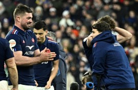 Gregory Alldritt (L) celebrates the Six Nations win with Antoine Dupont (R) 