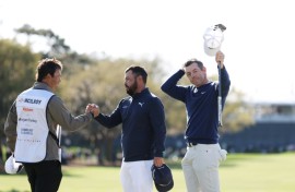 Rory McIlroy celebrates after clinching a playoff victory at The Players Championship in Florida on Monday