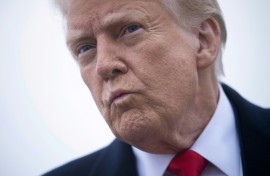 US President Donald Trump speaks to the press about the conflict in Ukraine before boarding Air Force One at Andrews Air Force Base March 14, 2025, in Maryland. Trump is spending the weekend at his Florida Mar-a-Lago resort.