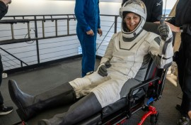 This photo provided by NASA shows NASA astronaut Suni Williams being helped out of a SpaceX Dragon spacecraft on board the SpaceX recovery ship MEGAN 