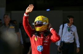 Lewis Hamilton celebrates taking pole position after the sprint qualifying session