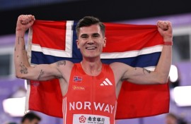 Norway's Jakob Ingebrigtsen celebrates winning he men's 3000m final at the Indoor World Athletics Championships in Nanjing, China