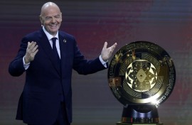 FIFA President Gianni Infantino with the Club World Cup Trophy during draw in December 2024