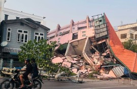 Rescuers in Bangkok try to find people trapped in the rubble of an under-construction skyscraper which collapsed in Friday's earthquake