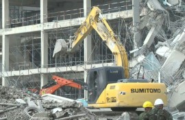 Rescuers search for survivors at Bangkok collapsed building site
