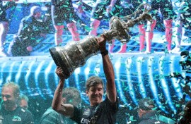 Team New Zealand's co-skipper and helmsman Peter Burling raises the America's Cup in Barcelona last year