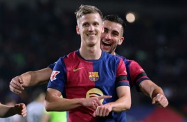 Barcelona midfielder Dani Olmo (front) has been playing under a temporary measure granted by Spain's sports council