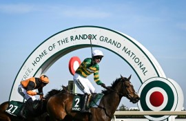 Mark Walsh enjoys that winning feeling after partnering Gentleman De Mee to victory in the Topham Chase over the Grand National fences