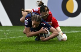 Emilie Boulard dives over the line to score for France against Scotland