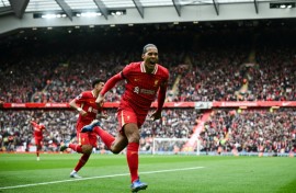 Liverpool defender Virgil van Dijk celebrates scoring against West Ham