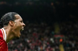 Liverpool defender Virgil van Dijk celebrates his winning goal against West Ham