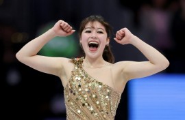 Alysa Liu celebrates after her free skate which won her the world championship in Boston last month