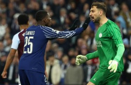 Goalkeeper Gianluigi Donnarumma (R) needed to be at his best as Paris Saint-Germain held on against Aston Villa on Tuesday to reach the Champions League semi-finals