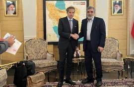 An Iranian Atomic Energy Organization picture shows IAEA chief Rafael Grossi (L) with IAEO spokesman Behrouz Kamalvandi in Tehran