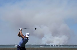 Justin Thomas tees off on the 18th hole at the RBC Heritage in South Carolina en route to a 10-under-par opening round