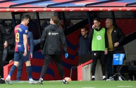 Barcelona's Polish forward Robert Lewandowski went off hurt against Celta Vigo on Saturday