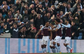 Aston Villa's Ollie Watkins (L) celebrates after scoring against Newcastle